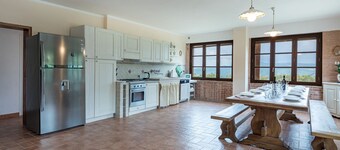 Surrounded by greenery and nature, a newly restored villa and an annex ideal for a group up to 14 pe