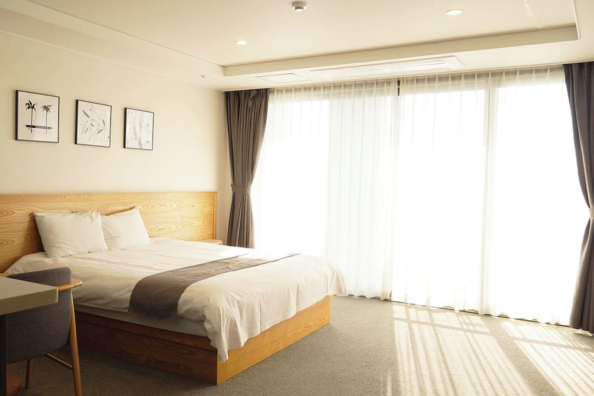 Deluxe-Doppelzimmer, Nichtraucher, Meerblick | 1 Schlafzimmer, Schreibtisch, laptopgeeigneter Arbeitsplatz