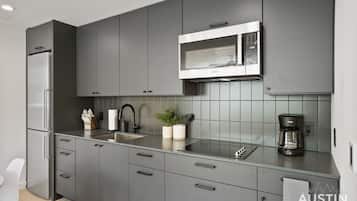 Fridge, microwave, stovetop, coffee/tea maker