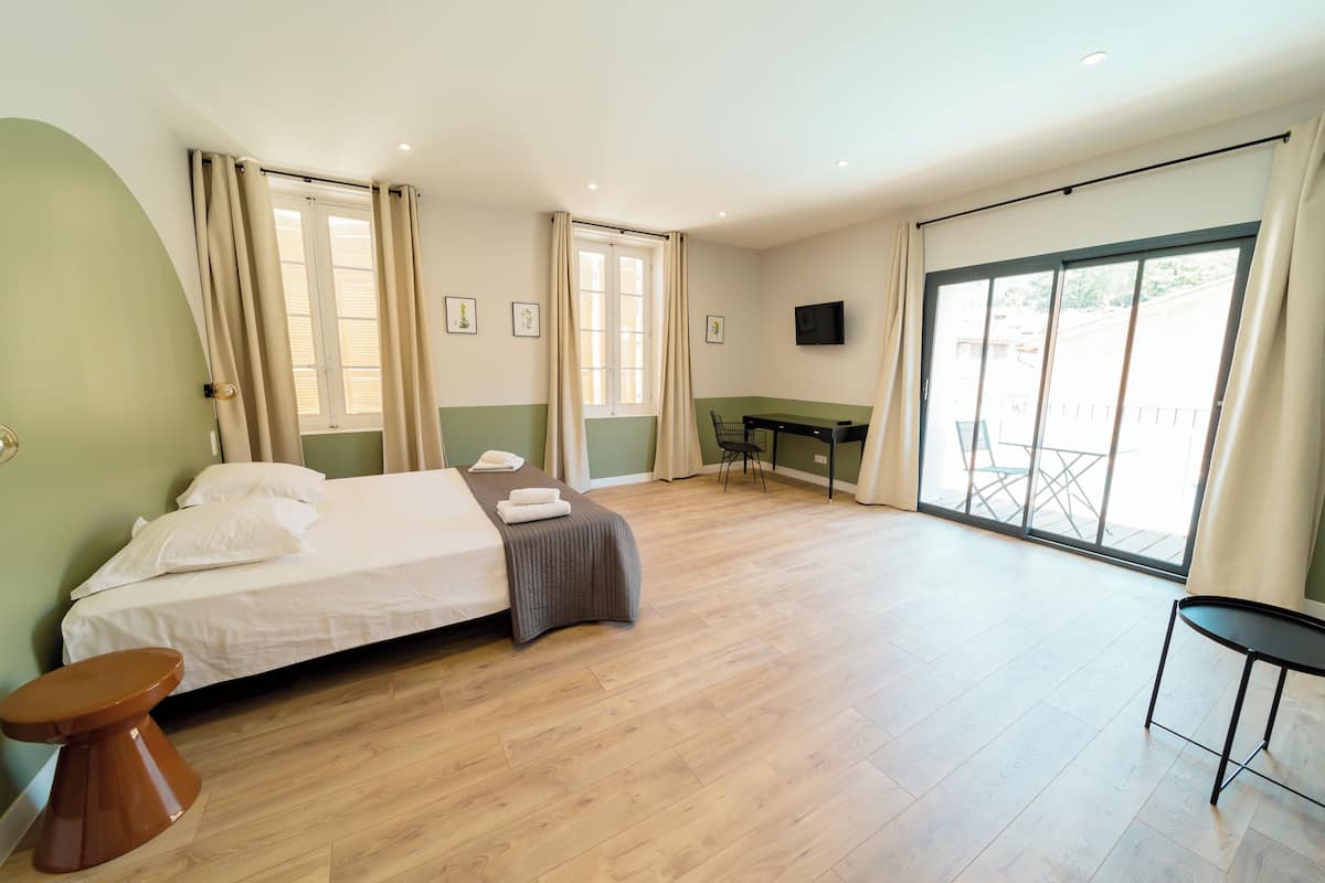 Deluxe Double Room, Pool View | Blackout drapes, iron/ironing board, free WiFi