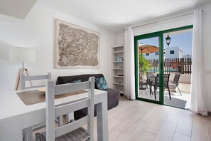 TV - Vacation Home "Piso Relax - Carpe Mundi" with Shared Pool & Wi-Fi (Corralejo)