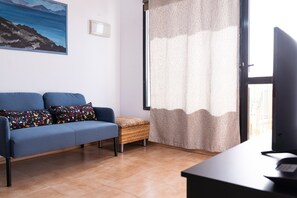 TV - Vacation Home 'Piso Dunas Blu - Carpe Mundi' with Shared Pool and Wi-Fi (Corralejo)