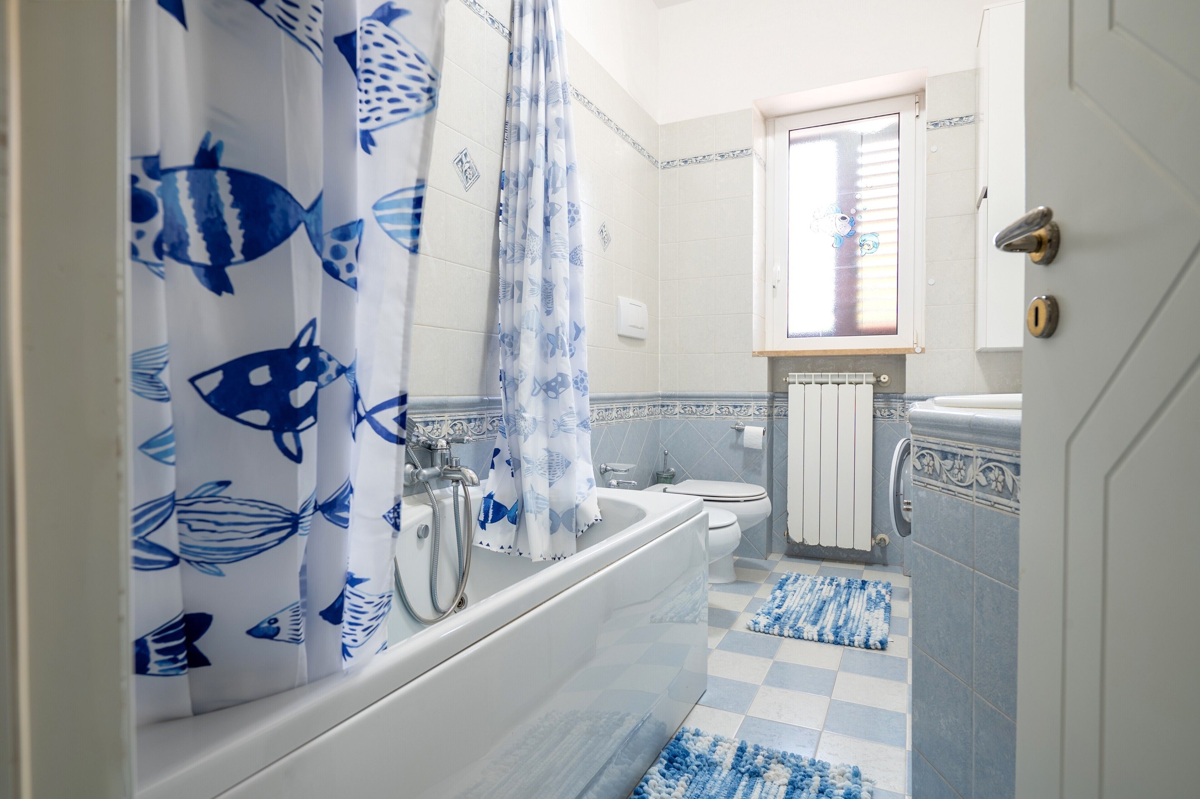 Badekar, hårføner og håndklær