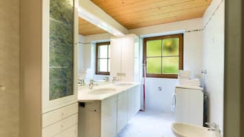 Bathtub, hair dryer, towels