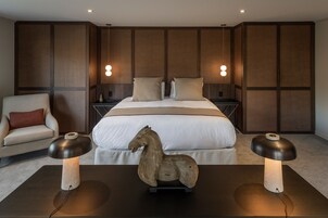 Premium Suite | 1 bedroom, blackout drapes, iron/ironing board, free WiFi