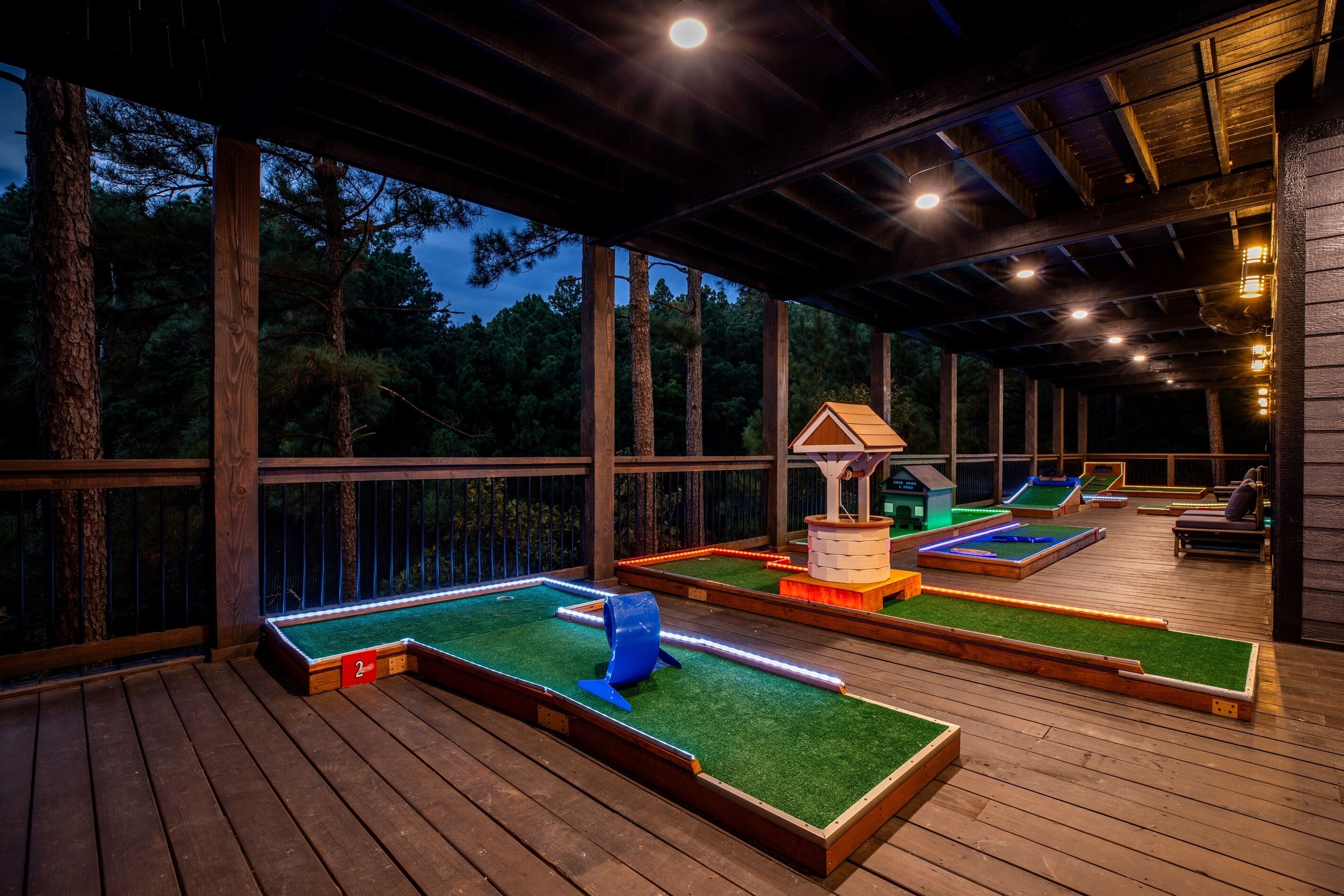 An outdoor pool area with multiple pools and lounge chairs.