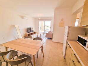 Comfort Apartment, 2 Bedrooms, Pool View | Private kitchen | Full-sized fridge, microwave, oven, stovetop - Hevean in Ben's MPV Apartment (Mazotos)