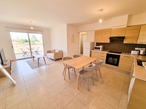 Comfort Apartment, 2 Bedrooms, Pool View | Living area | Flat-screen TV