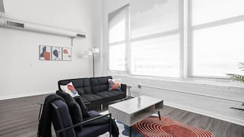 Apartment | Living area | 42-inch Smart TV with digital channels, Netflix, Hulu