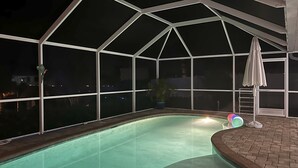A covered swimming pool with a clear view of the surrounding area.