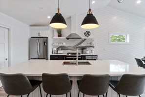 Fridge, microwave, oven, stovetop - The Lofts of Brick and Mortar-California Loft |High-End |Walk-Out Balcony |Dwntown |2 Kings |Parking (Lake Geneva)