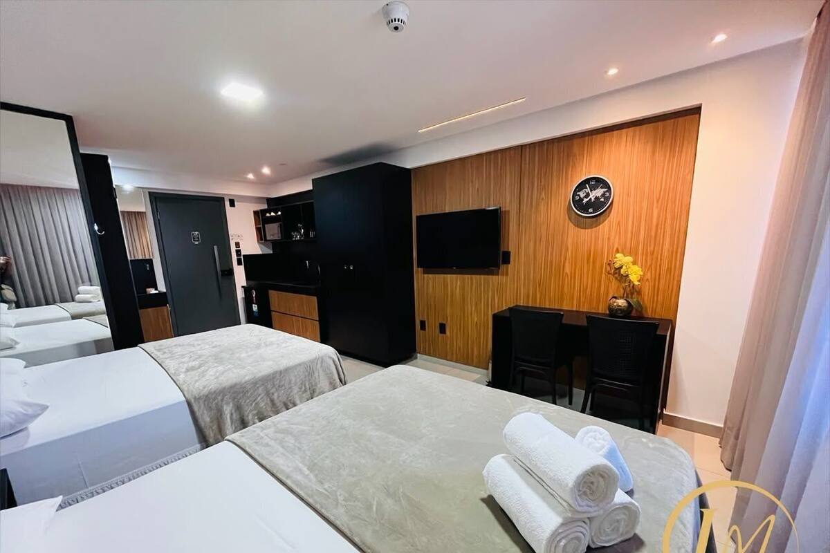 Premium bedding, pillow-top beds, desk, laptop workspace