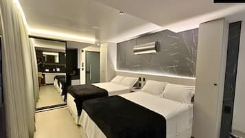 Premium bedding, pillowtop beds, desk, laptop workspace