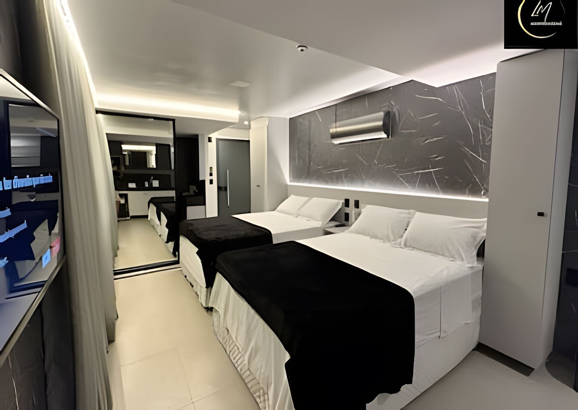 Premium bedding, pillow-top beds, desk, laptop workspace