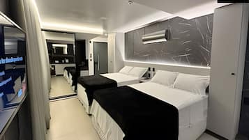 Premium bedding, pillow-top beds, desk, laptop workspace