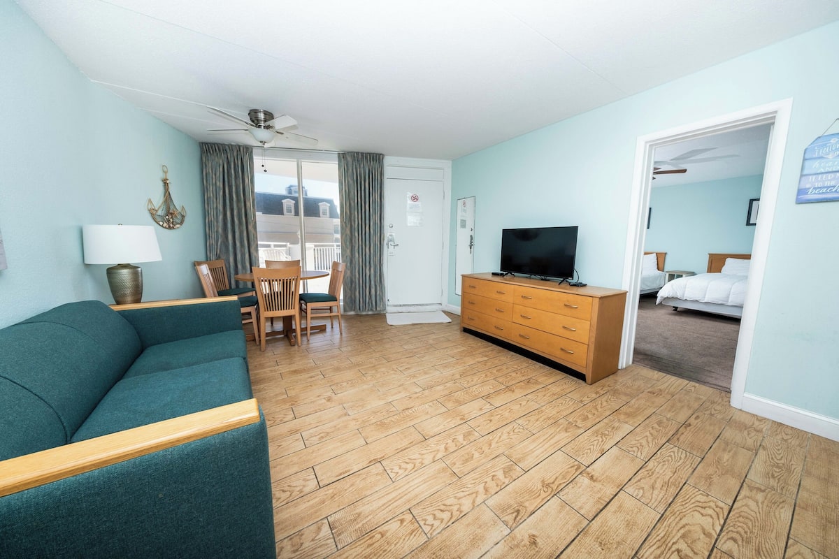 Family Suite | Living area | 45-inch flat-screen TV with cable channels