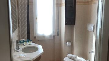 Shower, bidet, towels, soap