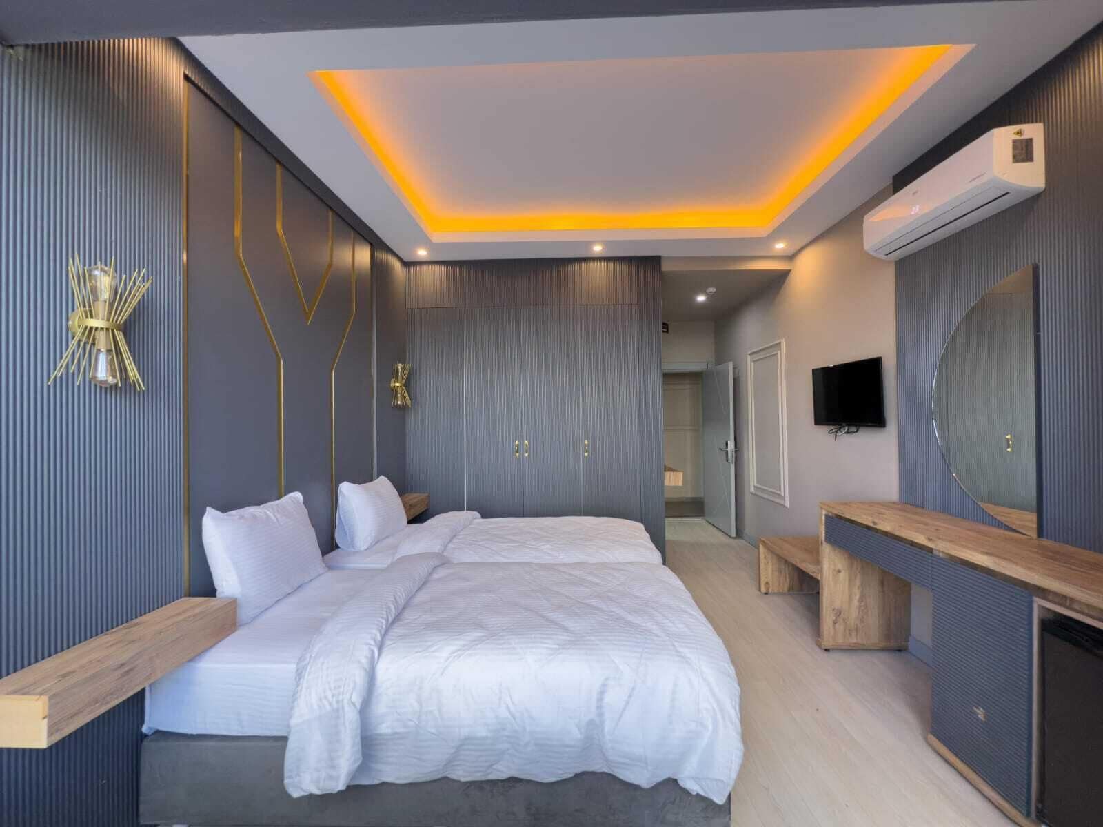 Family Room | Free minibar items, laptop workspace, soundproofing, free WiFi