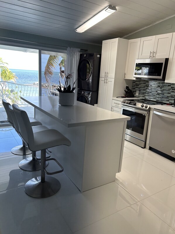 Private kitchen - Key Largo Oceanside 3/2 with 40 ft boat dock
Beautiful ocean view.
(Key Largo)