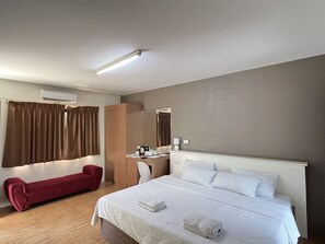 Chambre | Minibar, rideaux d’obscurcissement, fer et planche à repasser