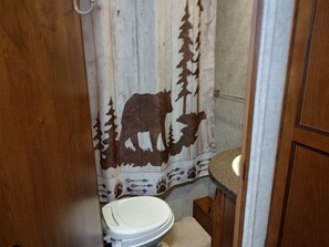 Hair dryer, towels, soap, toilet paper