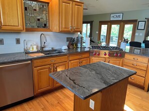 Microwave, oven, stovetop, dishwasher - Fully custom modern four bedroom home on 13 acres with a stocked pond. (Murphysboro)