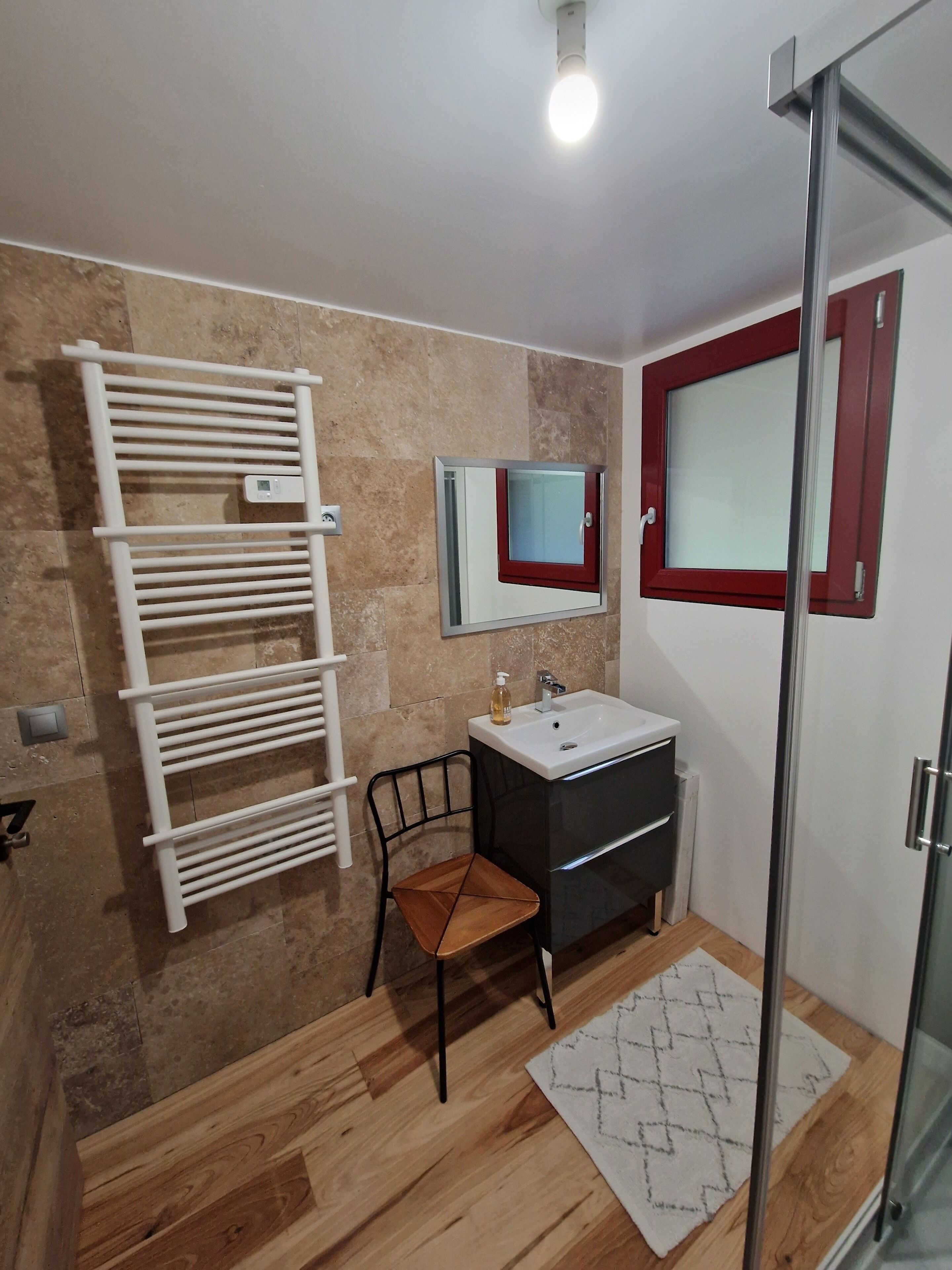 Shower, hair dryer, towels, toilet paper