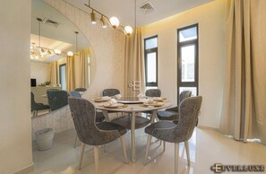 Dining - A modern luxurious 3 bedroom VILLA For family Gatherings, and Buiness meetings (AKOYA 2 - Damac Hills)
