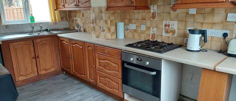 Fridge, oven, coffee/tea maker, toaster