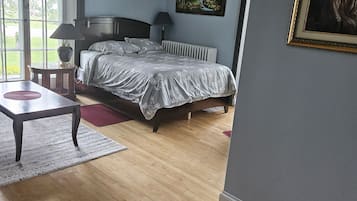 Down comforters, desk, laptop workspace, bed sheets