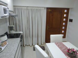Business Apartment, 1 Bedroom | Living area | Flat-screen TV - 19 de mayo 464 - Department (Bahia Blanca)