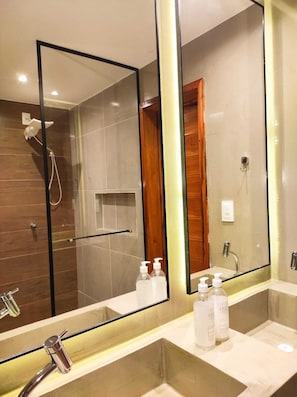 Shower, rainfall showerhead, hair dryer, towels