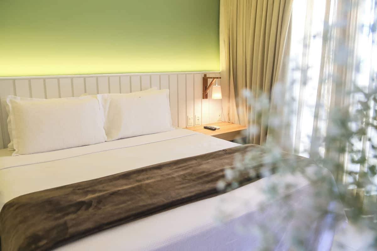QUARTO DELUXE CASAL | 1 slaapkamer, een minibar, een bureau, een laptopwerkplek