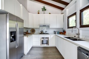 Fridge, microwave, stovetop, coffee/tea maker