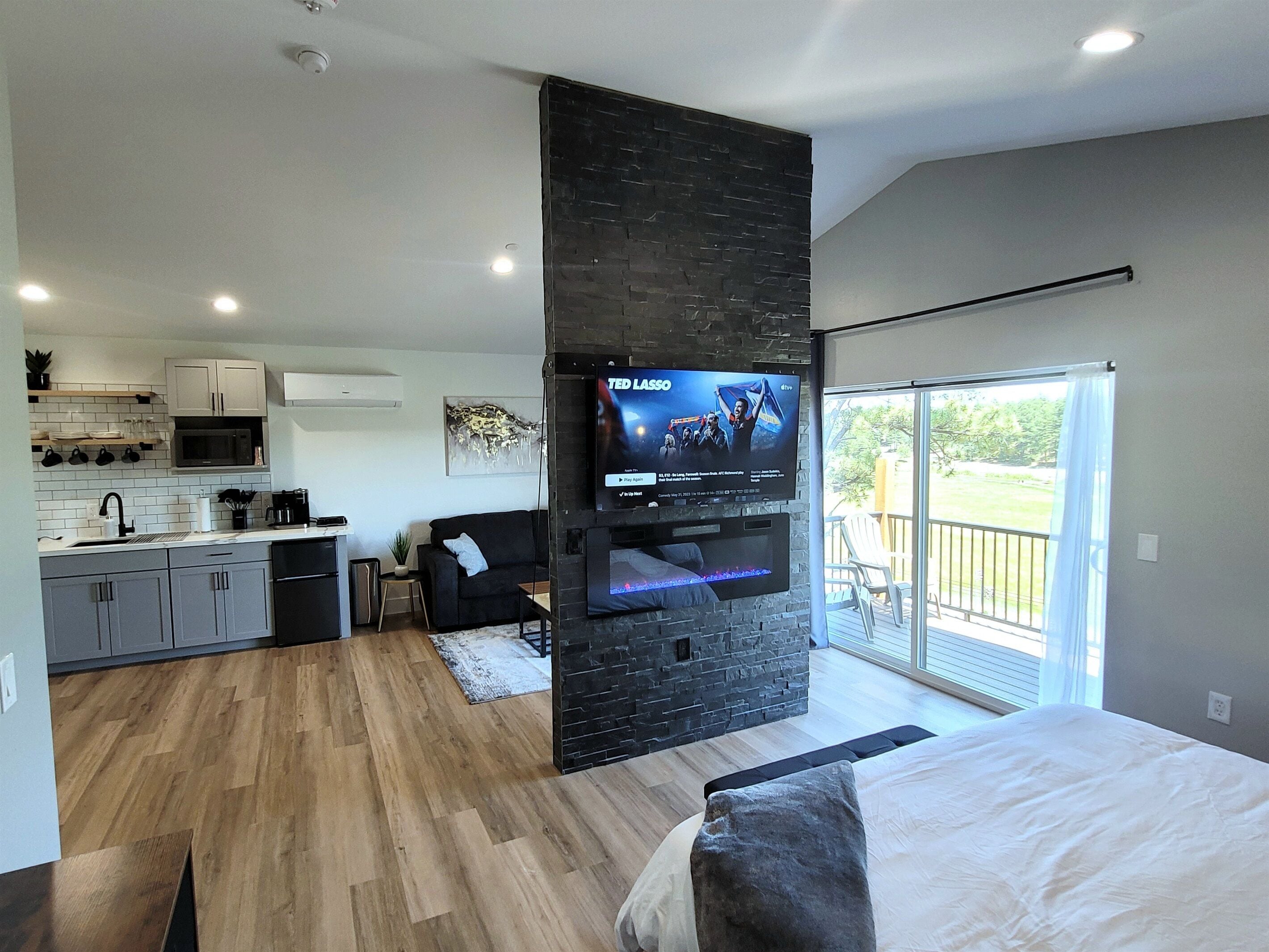 1 bedroom, desk, iron/ironing board, travel crib