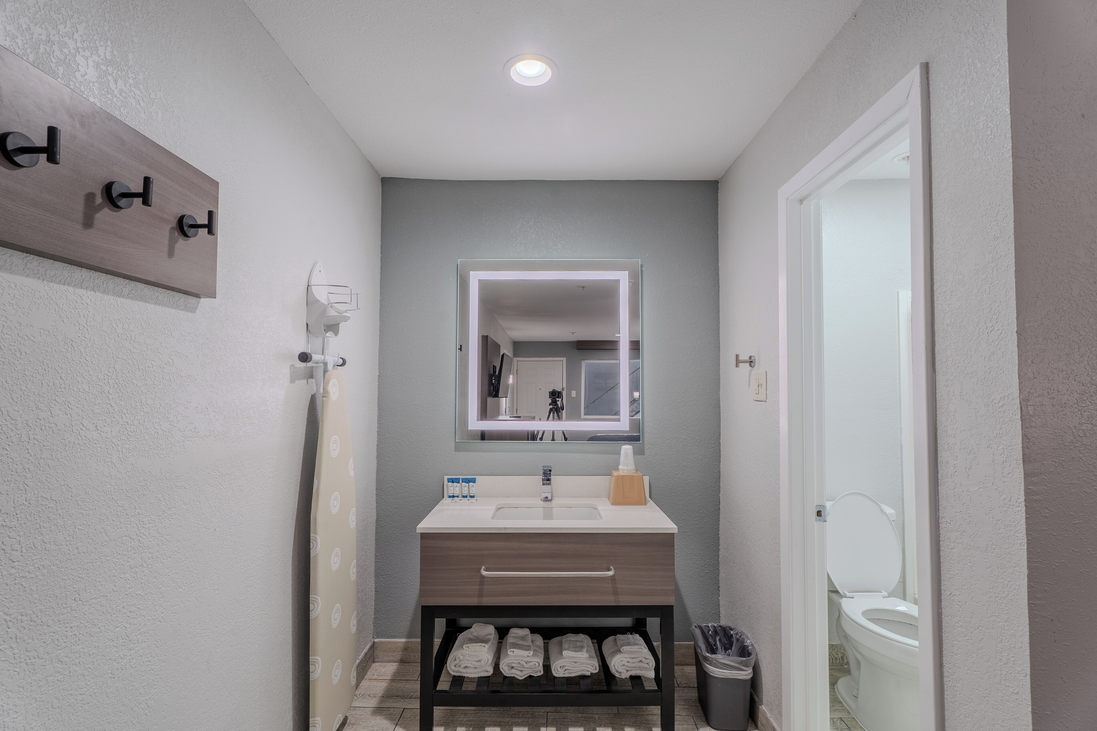 Bathtub, hair dryer, towels, soap