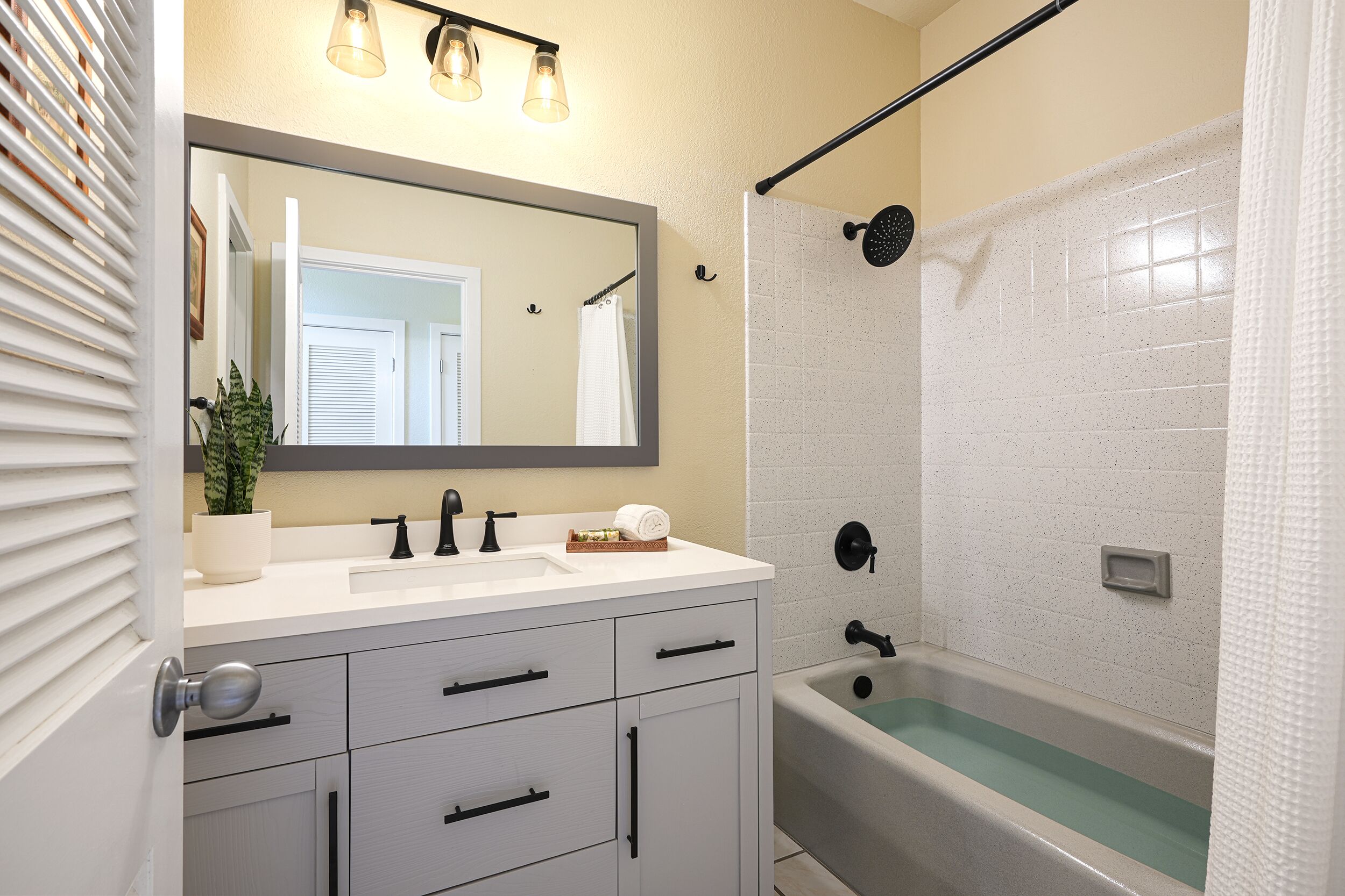 Bathtub, hair dryer, towels