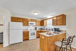 Fridge, microwave, oven, stovetop - Stylish 2BR Near Hospital King Bed Fast WiFi (Winston-Salem)