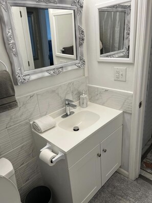 Hair dryer, towels, soap, toilet paper