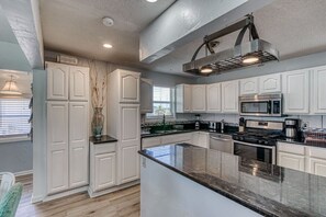 Fridge, microwave, oven, stovetop - Spring Break & Summer Beach House w/Game Room (Gulf Shores)