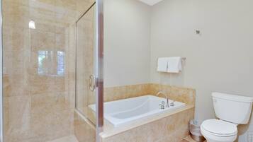 Bathtub, hair dryer, towels