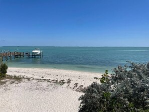 On the beach, sun loungers, beach towels
