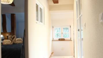 2 bedrooms, desk, iron/ironing board, travel crib