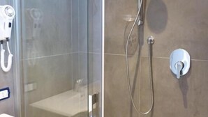 A modern bathroom with a glass-enclosed shower, a handheld showerhead, and a wall-mounted faucet. - Hotel D'annunzio (Cattolica)