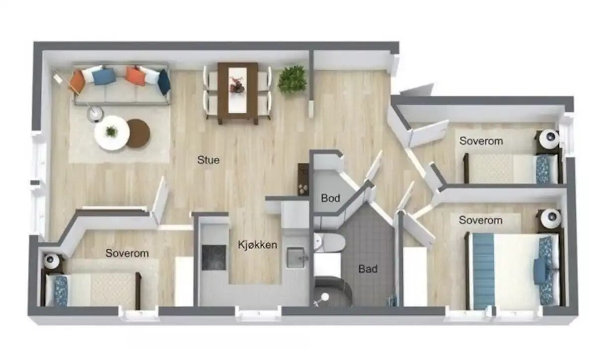 Un plan d’étage d’un hôtel comprenant un salon, un coin repas, une cuisine, une salle de bain et deux chambres.