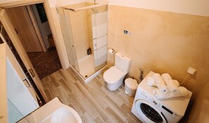 Hair dryer, bidet, towels, soap
