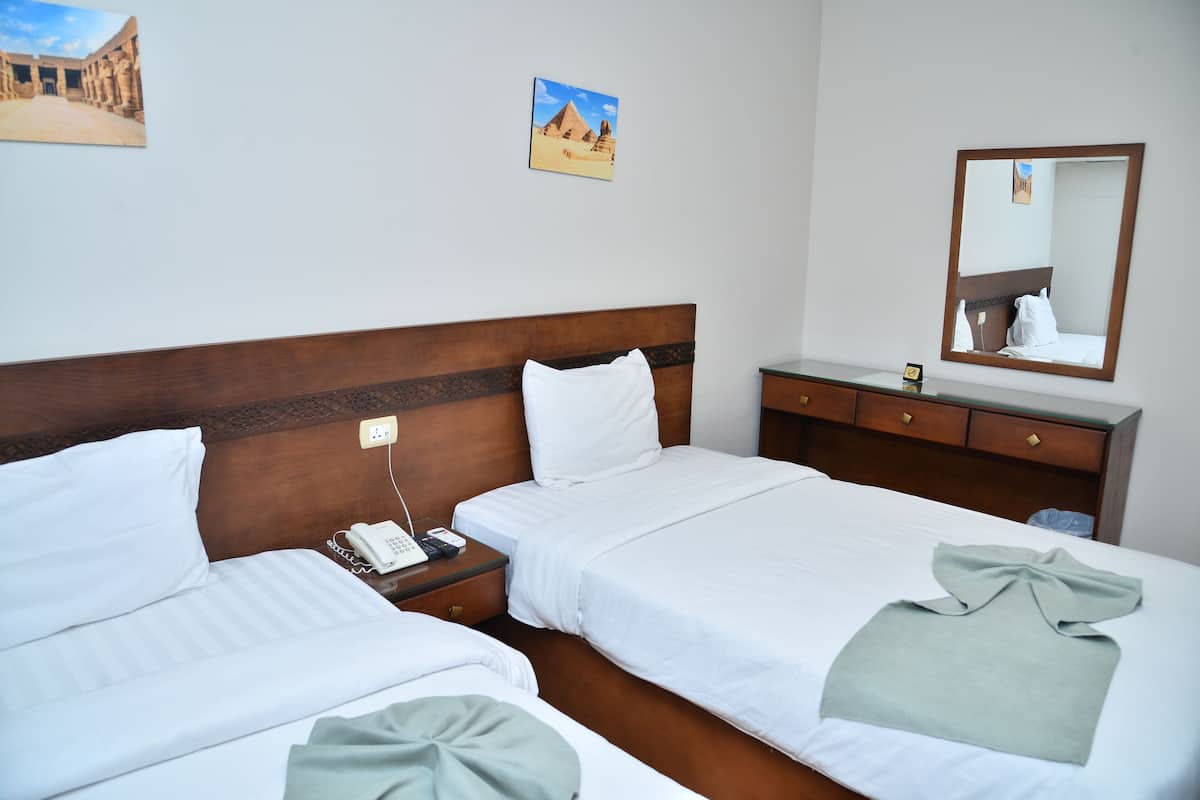 Egyptian cotton sheets, premium bedding, minibar, laptop workspace