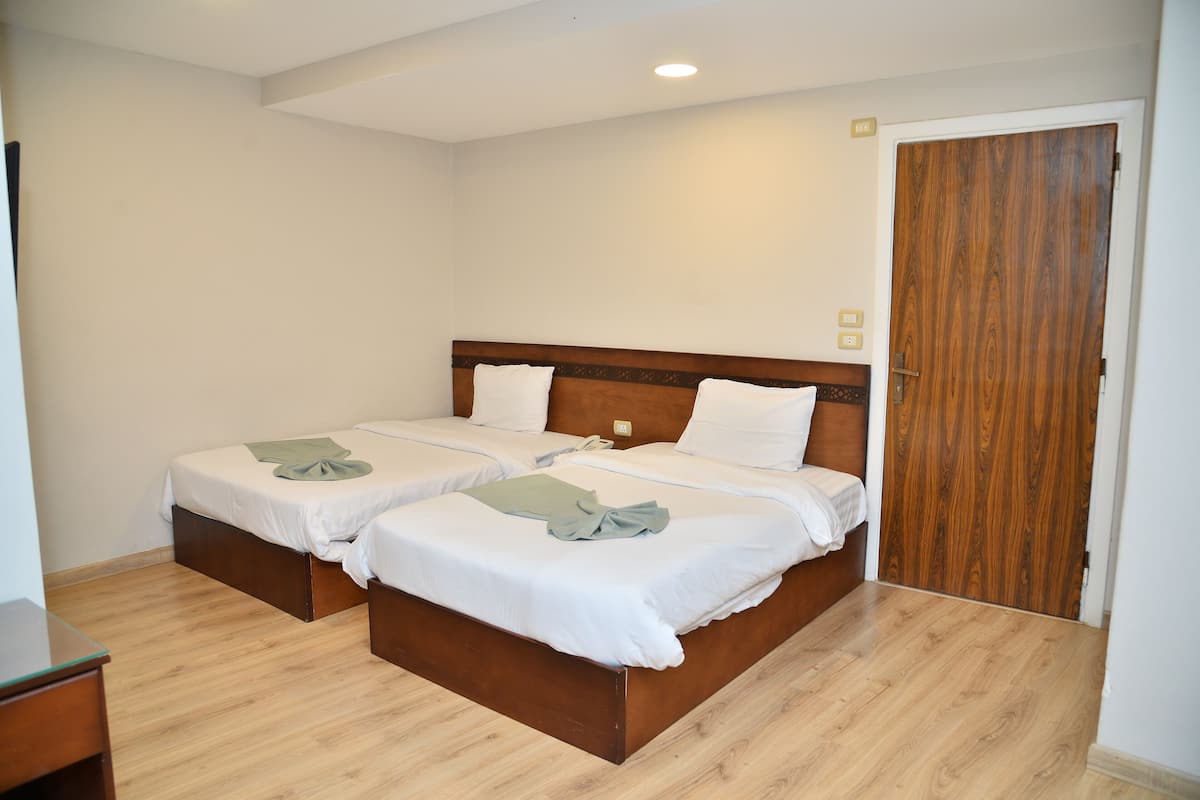 Egyptian cotton sheets, premium bedding, minibar, laptop workspace