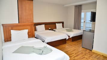 Egyptian cotton sheets, premium bedding, minibar, laptop workspace