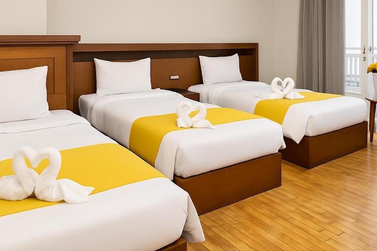 Kamar Triple Superior | Seprai katun Mesir, seprai premium, dan minibar